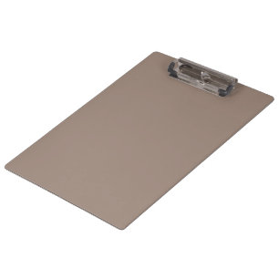a brown wall with a clock on it clipboard