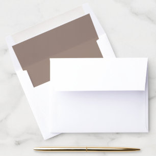 a brown wall with a clock on it envelope liner