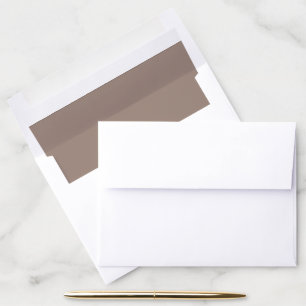 a brown wall with a clock on it envelope liner
