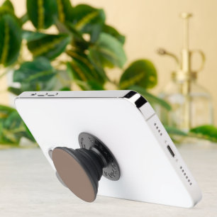 a brown wall with a clock on it PopSocket