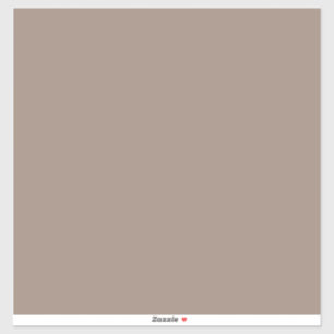 a brown wall with a sticker