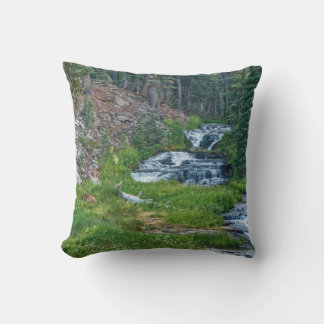 A Buck Rests at a Cascading River Throw Pillow