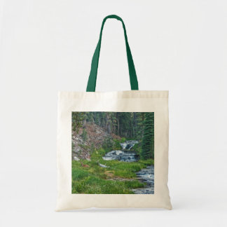A Buck Rests at a Cascading River Tote Bag
