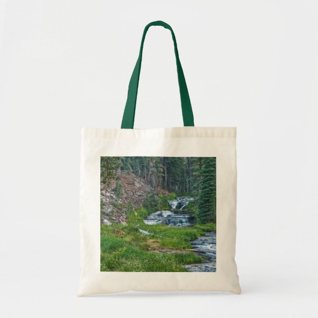 A Buck Rests at a Cascading River Tote Bag (Front)