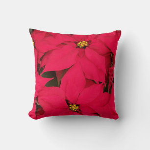 A bunch of Brightly Colored Christmas Poinsettias Throw Pillow