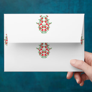 a bunch of red flowers on a white background envelope
