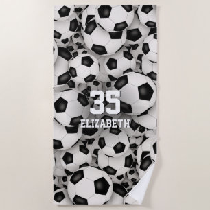 a bunch of soccer balls fun sports pattern beach towel