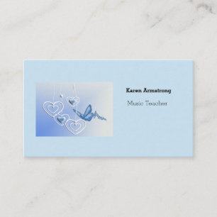 A butterfly and hearts business card