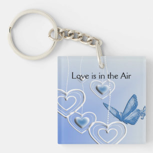 A butterfly and hearts keychain