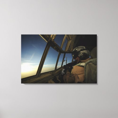 A C_130 Hercules pilot scans the horizon Canvas Print