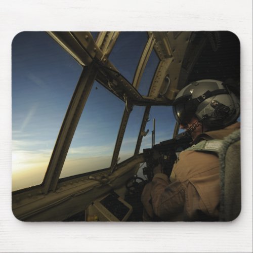 A C_130 Hercules pilot scans the horizon Mouse Pad
