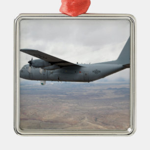 A C-130 Hercules soars through the sky Metal Ornament