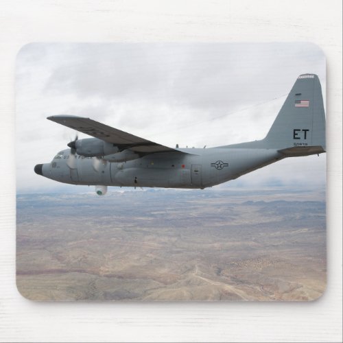 A C_130 Hercules soars through the sky Mouse Pad