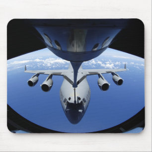 A C-17 Globemaster III receives fuel Mouse Pad