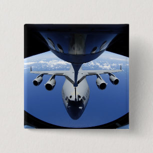 A C-17 Globemaster III receives fuel Pinback Button