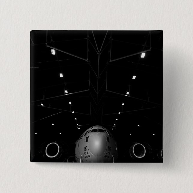 A C-17 Globemaster III sits in a hangar Pinback Button (Front)