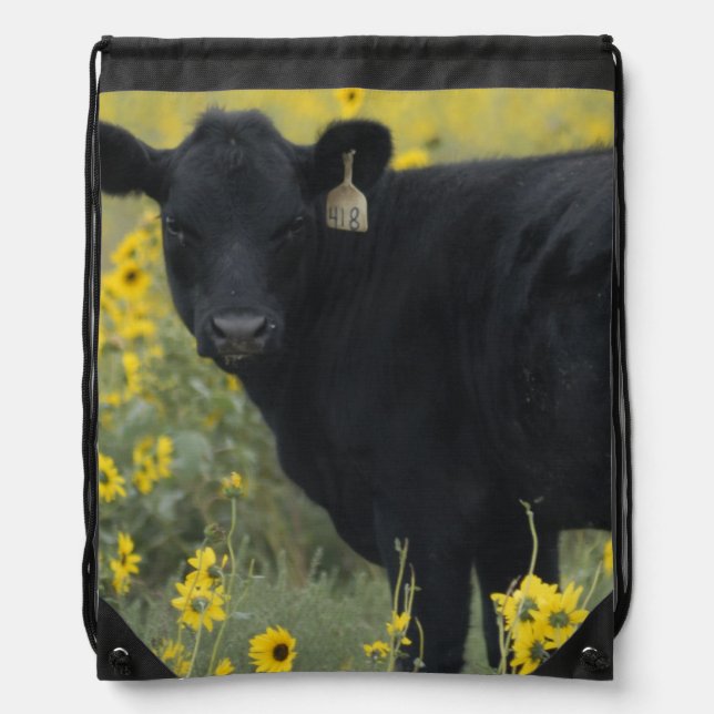 A calf amid the sunflowers of the Nebraska Drawstring Bag (Front)