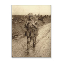 A Canadian Tommy soldier covered in mud returning
