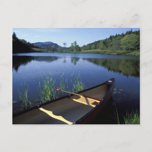 A canoe rests on the shore of Little Long Pond Postcard