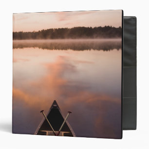 A canoe rests on the shore of Pawtuckaway Lake 3 Ring Binder