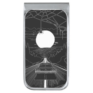 A car driving through the forest and mountains silver finish money clip