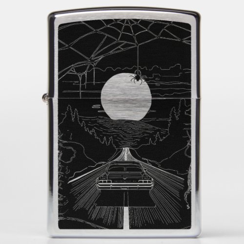 A car driving through the forest and mountains zippo lighter