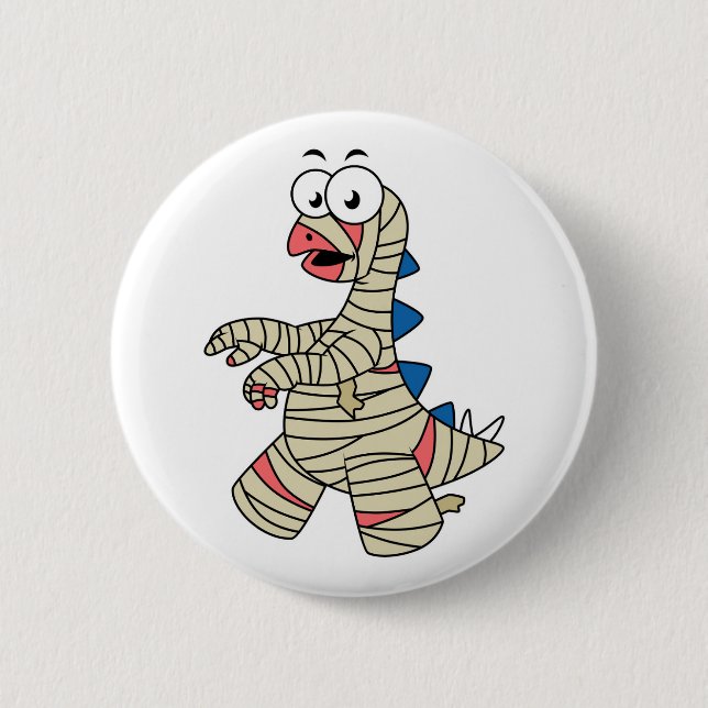 A Cartoon Stegosaurus Dressed Up As A Mummy. Button (Front)