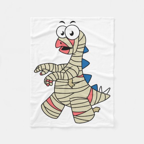 A Cartoon Stegosaurus Dressed Up As A Mummy Fleece Blanket