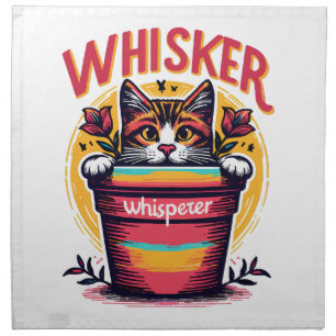 A cat peeking out from behind a flowerpot cloth napkin
