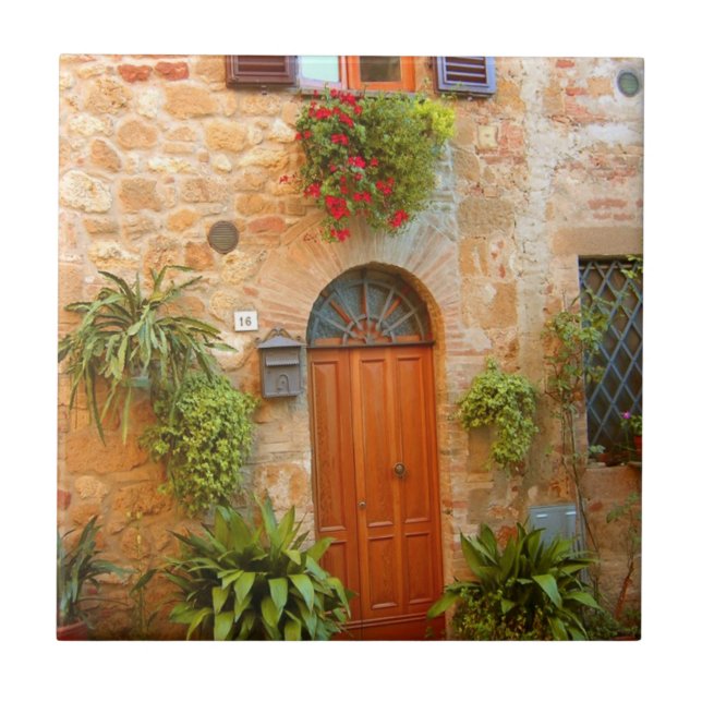 A cat seeks entrance to home in Pienza, Italy Ceramic Tile (Front)