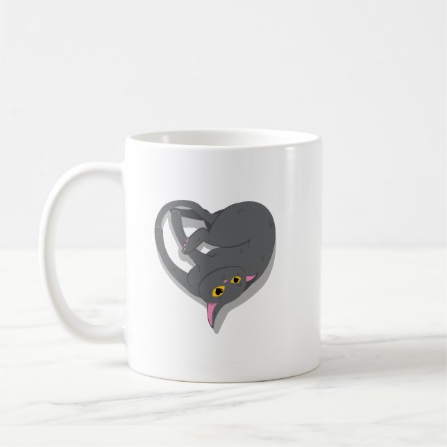 A cat shaped like a heart. coffee mug (Left)