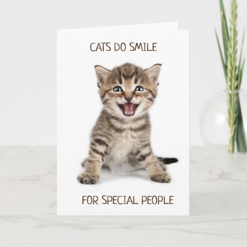 A CAT WHO DOES SMILE SAYS HAPPY BIRTHDAY CARD