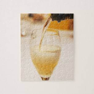 A champagne glass flute being filled with Gosset Jigsaw Puzzle