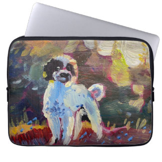 A cheerful black-and-white poodle laptop sleeve