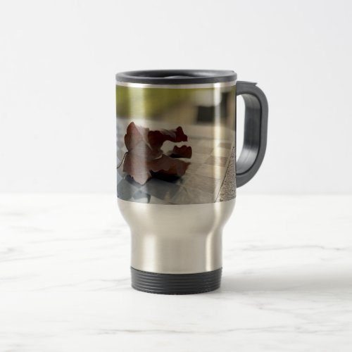 A chess lesson travel mug