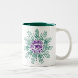 A circle of hands and an Eye Two-Tone Coffee Mug