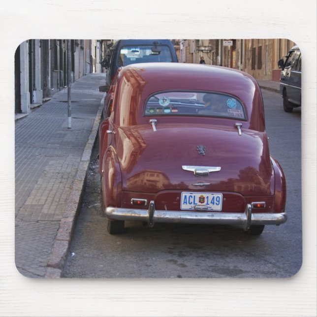 A classic old red Peugeot car parked on a street Mouse Pad (Front)