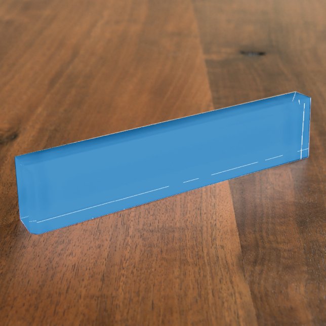 A clear blue sky with no clouds fills the entire f desk name plate (Side)