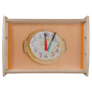 a clock made of piadina on large tray