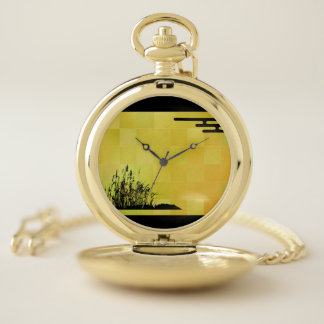 A clock with a black Japanese pattern on a gold le Pocket Watch