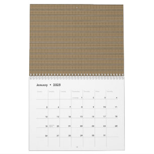 A close-up image showcasing a fabric with a tan an calendar