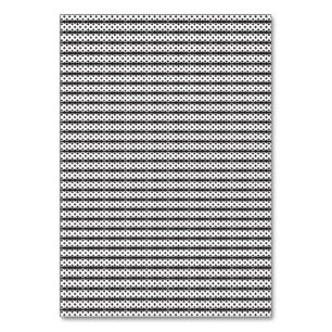 A close-up of a fluffy orange and white cat lying  table number