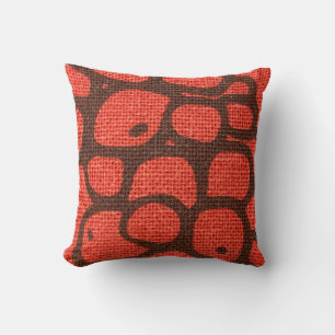 A close-up of a textured fabric abstract pattern throw pillow