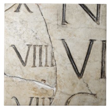 A Close-up Of Ancient Roman Letters On Marble. Tile by prophoto at Zazzle