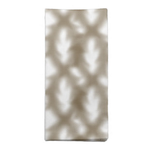 A close-up view of a crisscrossing wire mesh grid  cloth napkin