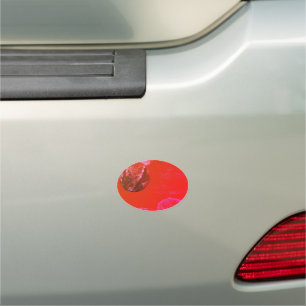 A close up view of fantasy worlds and their moons car magnet
