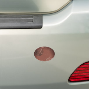 A close up view of fantasy worlds and their moons car magnet