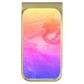 A close up view of fantasy worlds and their moons gold finish money clip