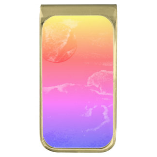 A close up view of fantasy worlds and their moons gold finish money clip
