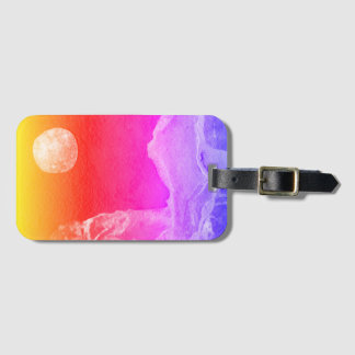 A close up view of fantasy worlds and their moons luggage tag